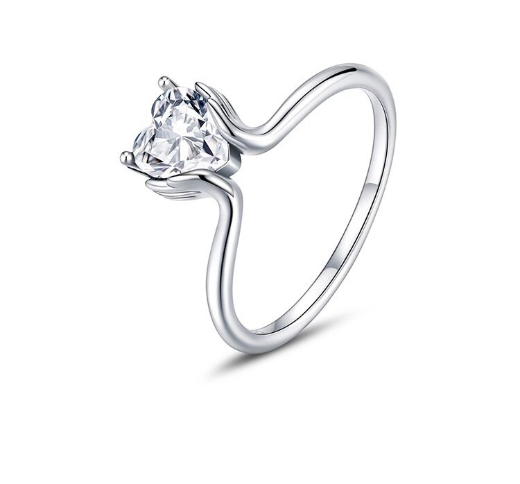 Stříbrný prsten Srdce v dlaních s velkým zirkonem 925/1000
